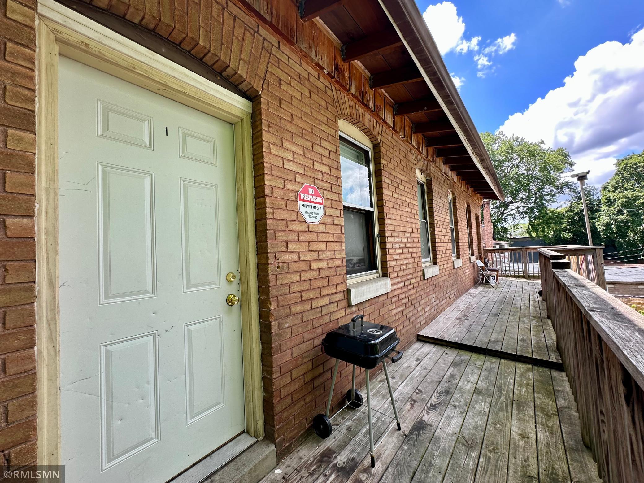 Back Deck - Leads to back entrances for the 2 rental units (above liquor stove and restaurant kitchen)