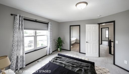Digitally Staged Primary Bedroom