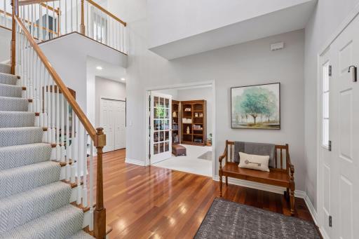 Just off the main foyer are glass FrJut off the main foyer are glass French doors leading the den/office