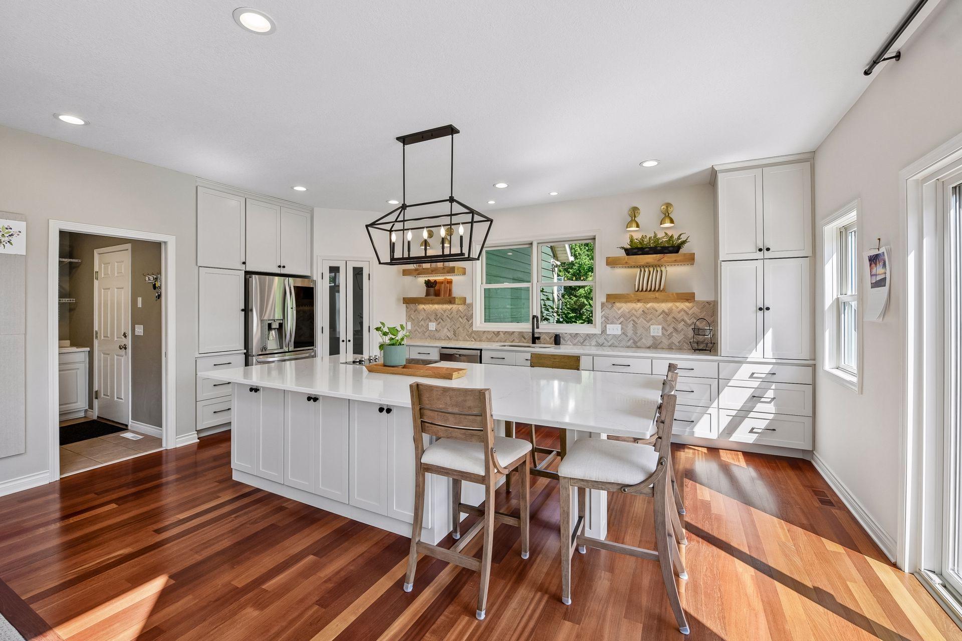 Quartz center island, updated double hung windows, new appliances, gorgeous new cabinets, shelving and lighting were all part of the remodel879 Sandbar Circle - Spacecrafting - 0020.jpg