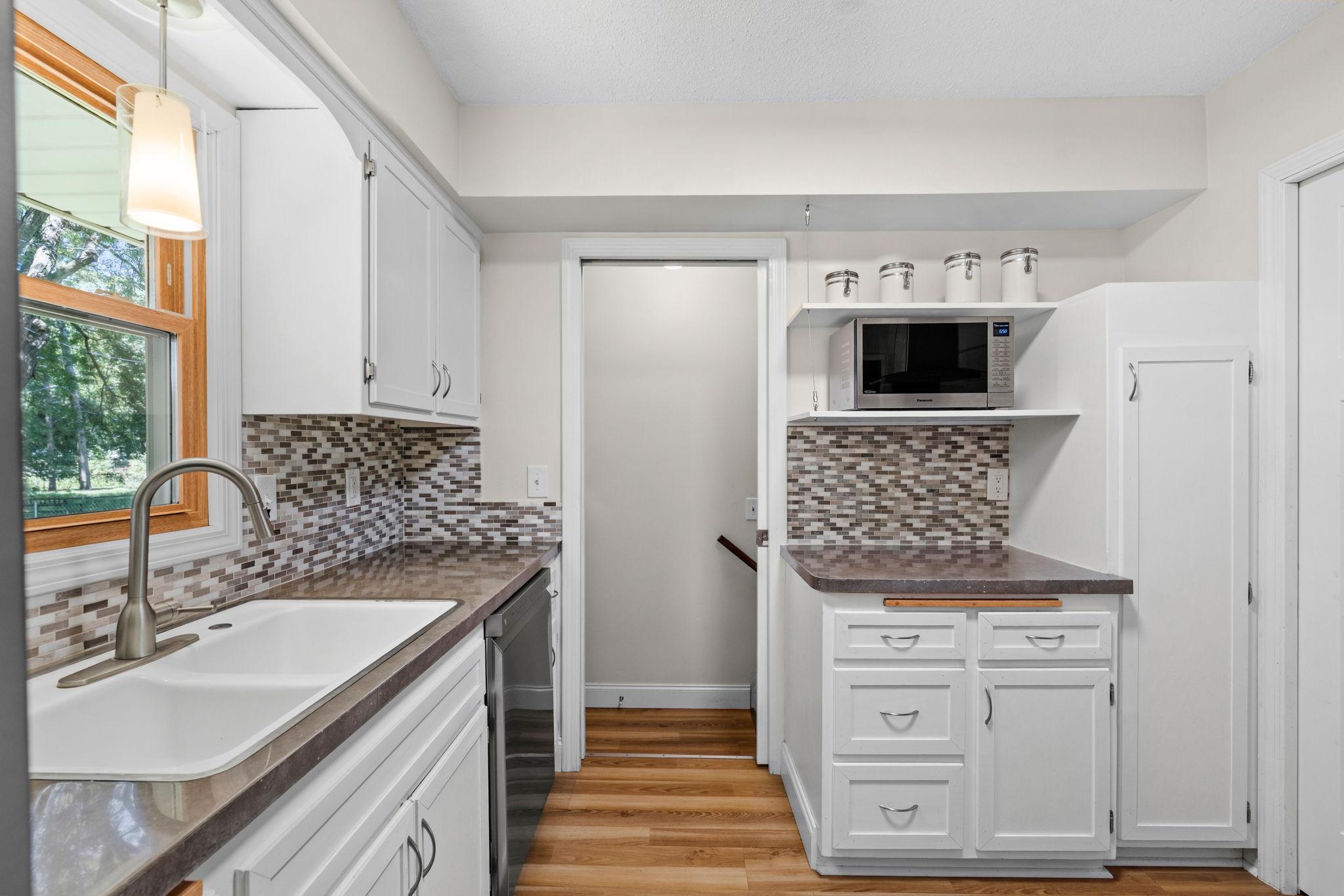 Bright kitchen with a large pantry