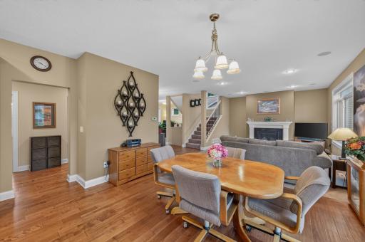 At the heart of this home, this inviting dining area flows effortlessly into the living room, creating a warm, connected space that's ideal for everyday meals to special occasions.