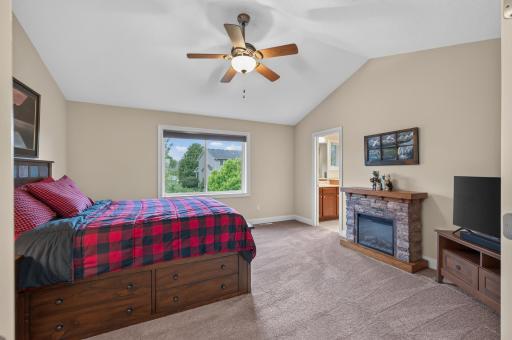 Here is an alternate view of the primary suite looking toward the private en-suite bathroom.