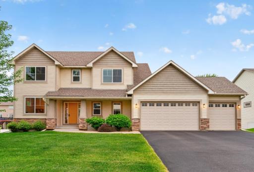 Welcome home to this stunning two story home featuring exceptional curb appeal, a spacious three car garage, mature landscaping, and a charming covered front porch that makes a lasting first impression.