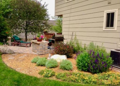 The beautifully-landscaped garden adds even more value.