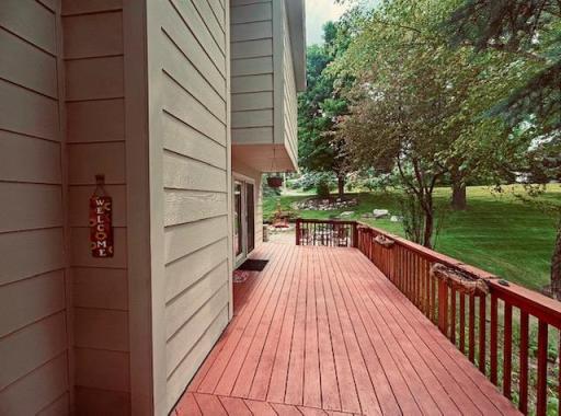 The deck continues on to the backyard patio. Entertaining a large group of guests would be an option for the new homeowner.
