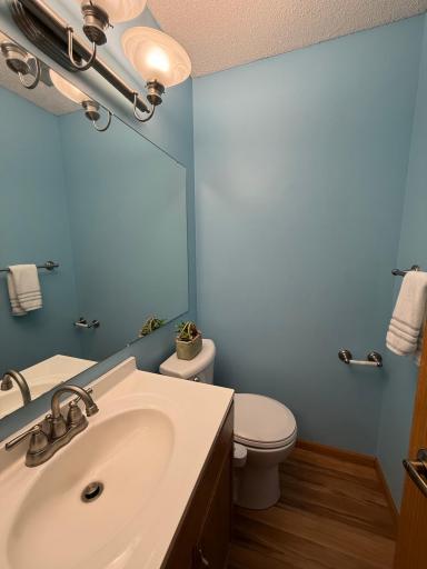 There is a convenient powder bath between the living room and kitchen.