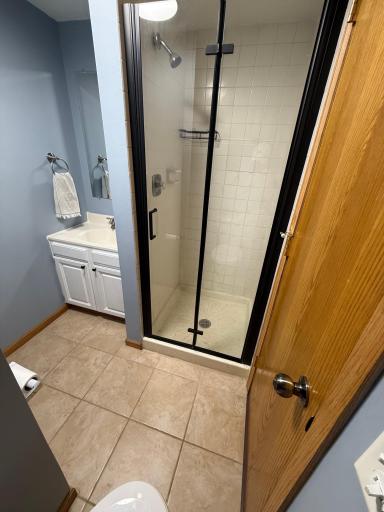 A smartly-updated 3/4 bath serves the lower level.