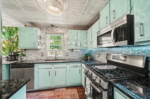 Kitchen and Window - Green Cupboards