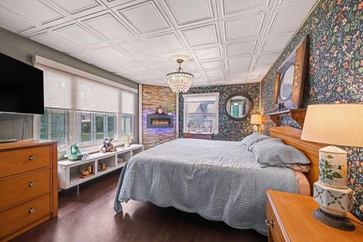 Primary Bedroom with Electric Fireplace Chandelier