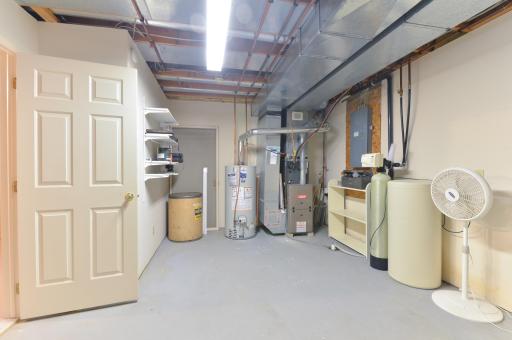 Large utility and storage room provides additional functional space on the lower level.