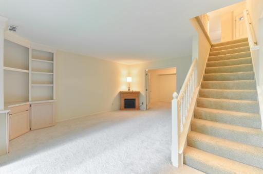 Spacious lower-level family room offers plenty of room for relaxing and entertaining.