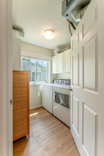Off of the kitchen is the laundry room, utility area and additional storage.