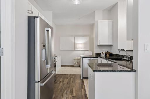 The refrigerator is high end and it has ice and water dispensers.