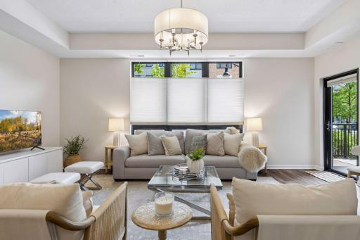 This expansive room is 20 feet wide so furniture placement is easy with many options. The door leads to a 12 X 7 patio!