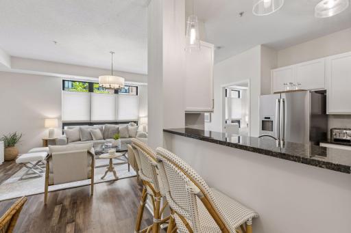 See the two banks of very tall windows - three in the living room and three in the bedroom.