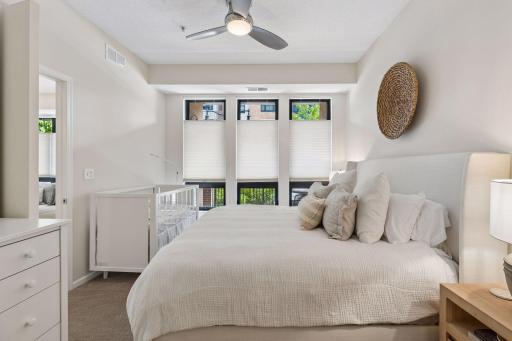 Serenity is apparent in this room....it accommodates a king sized bed and dressers.