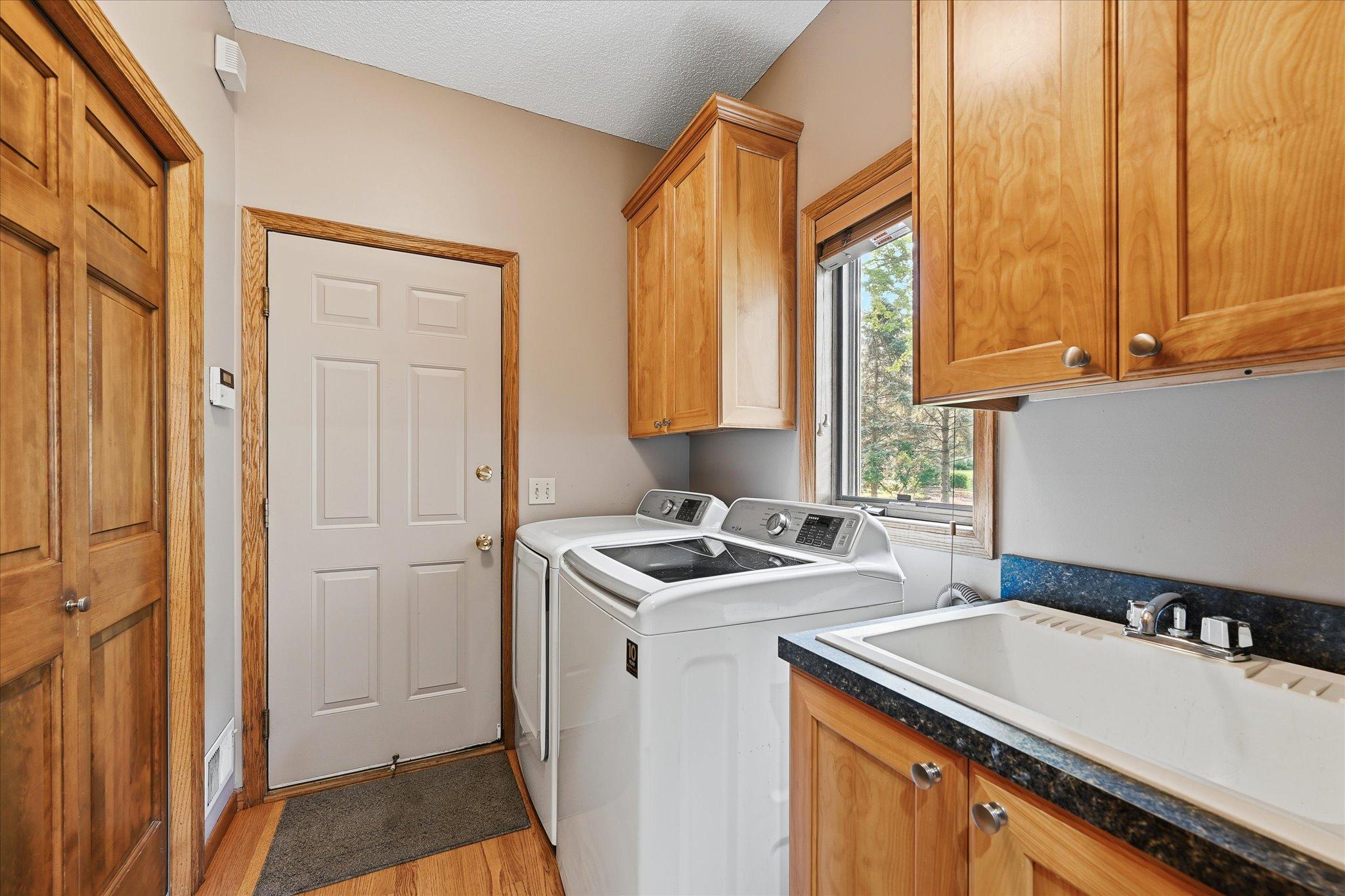 A dedicated laundry room on the main level keeps everyday tasks conveniently located.