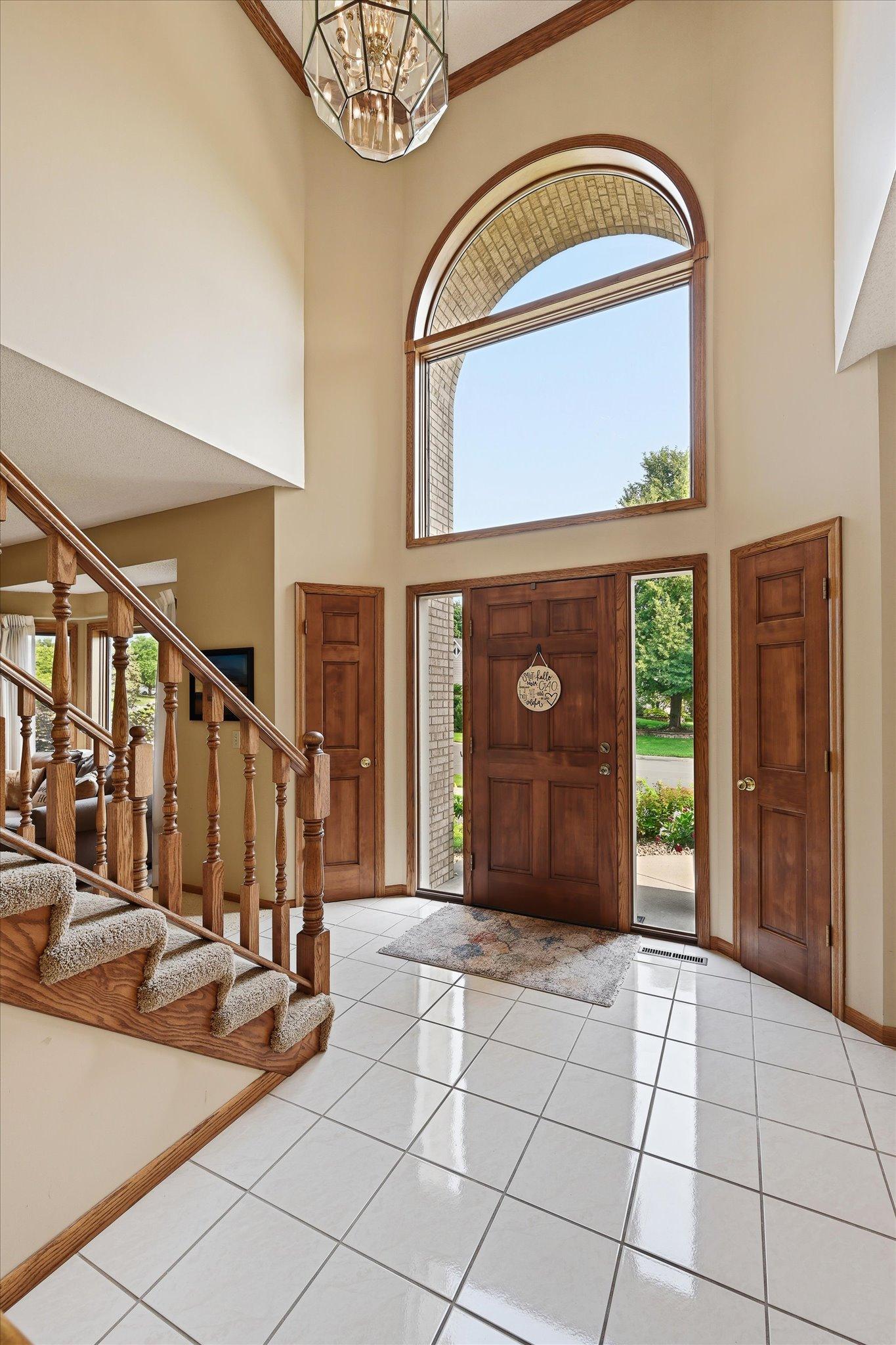 A vaulted foyer creates an open, airy entry and a natural transition into the main level.