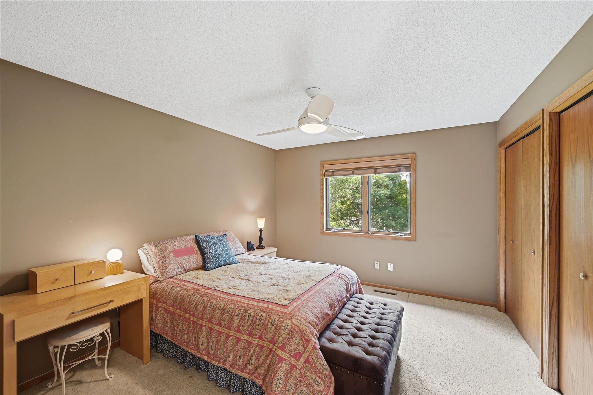 The second bedroom offers comfortable proportions and generous closet space.