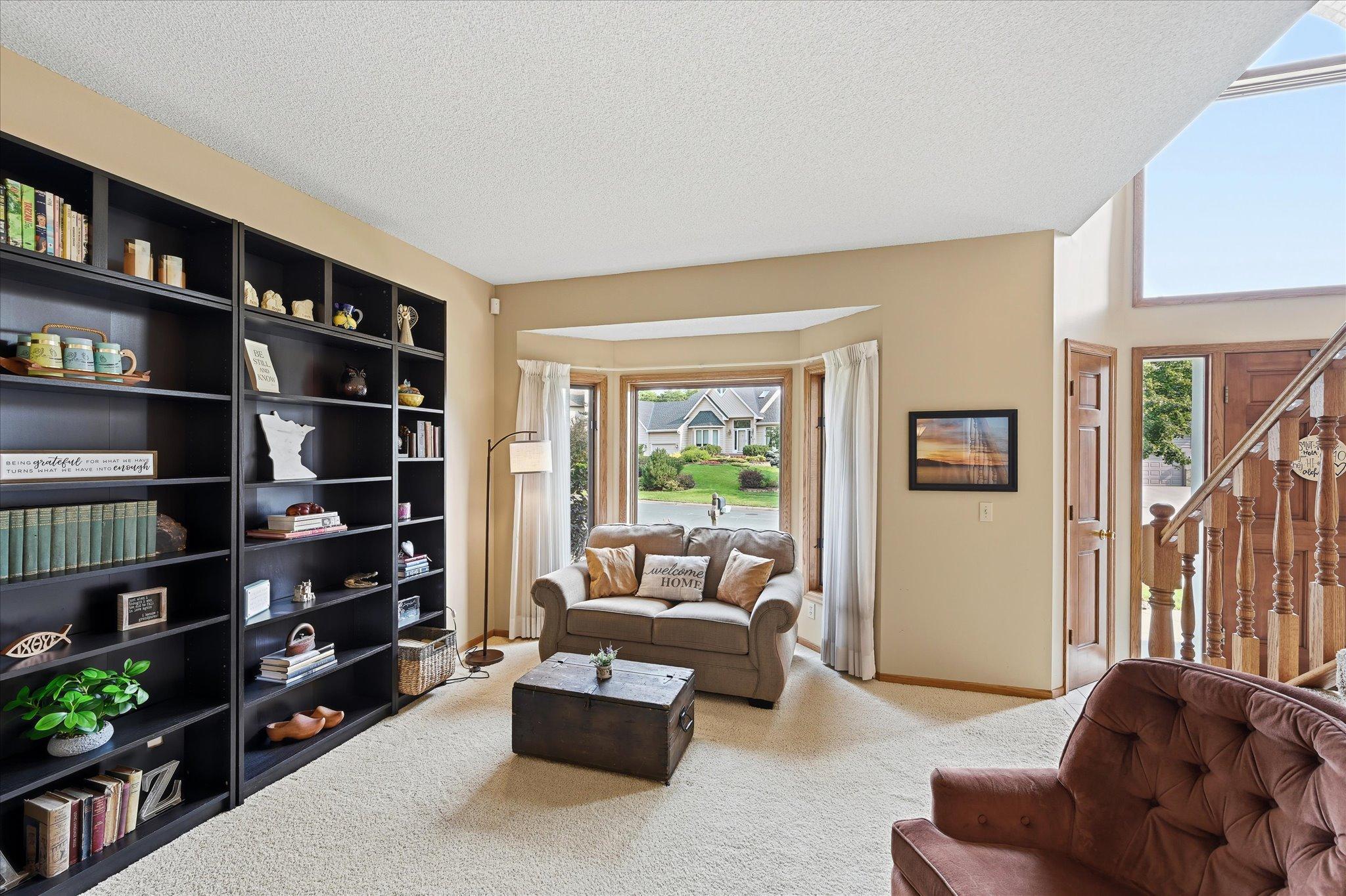 The living room offers flexible space for relaxing, entertaining, or creating a comfortable conversation area.