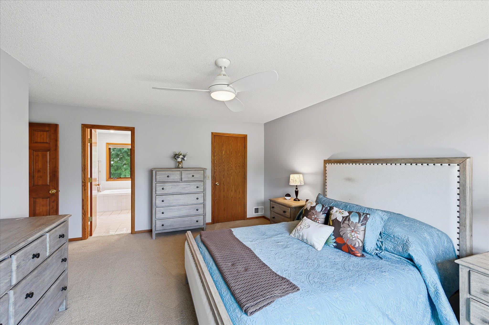 A spacious walk-in closet provides generous storage just off the primary suite.