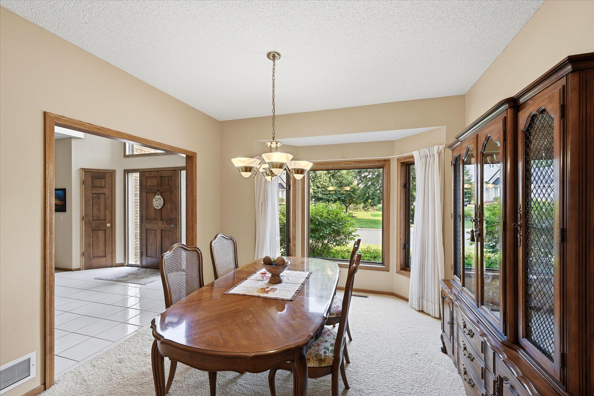 A dedicated formal dining area provides additional space for hosting meals and gatherings.