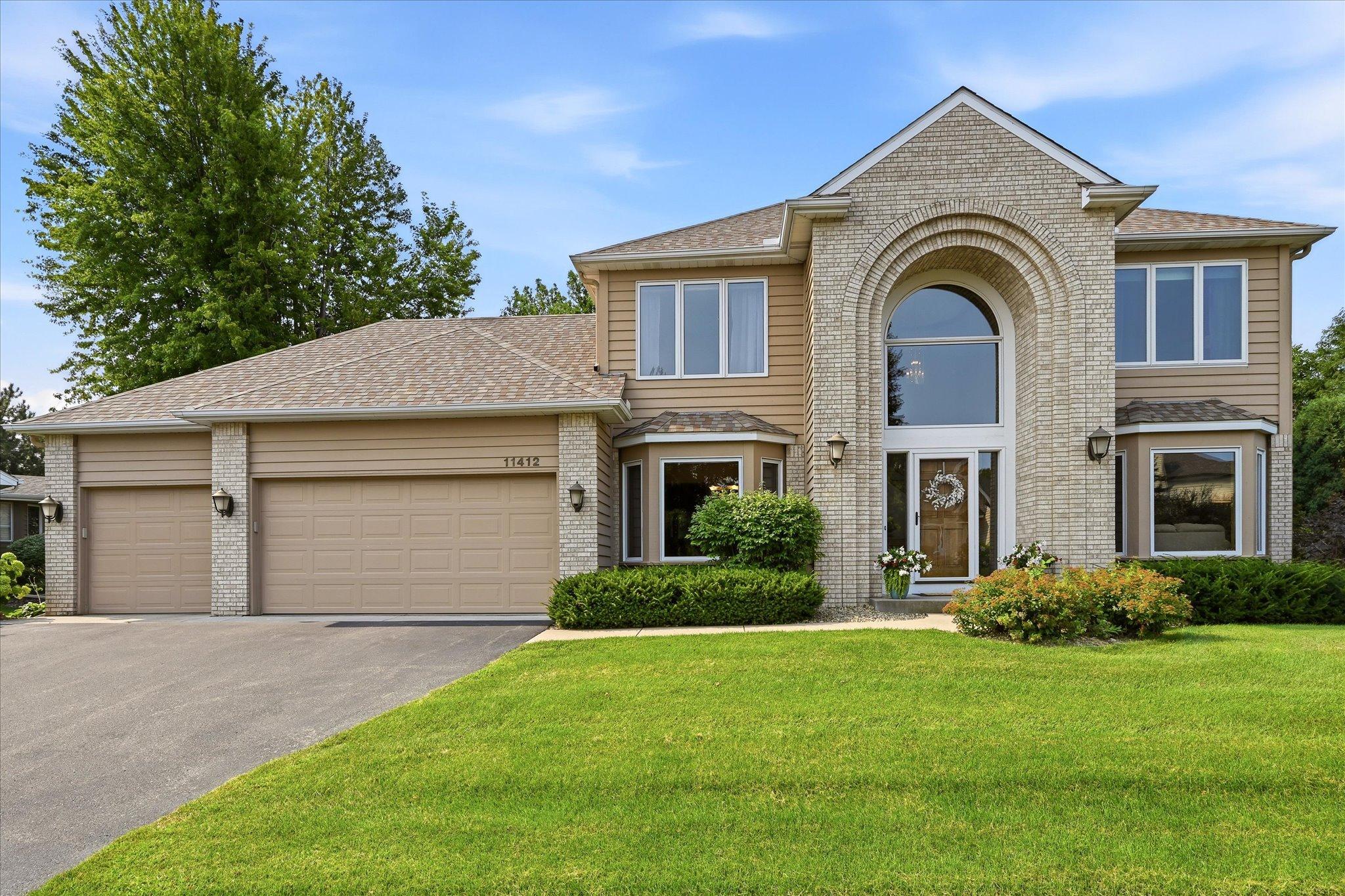 Welcoming curb appeal sets the tone for this spacious two-story home, with a 3-car garage and inviting front entry.