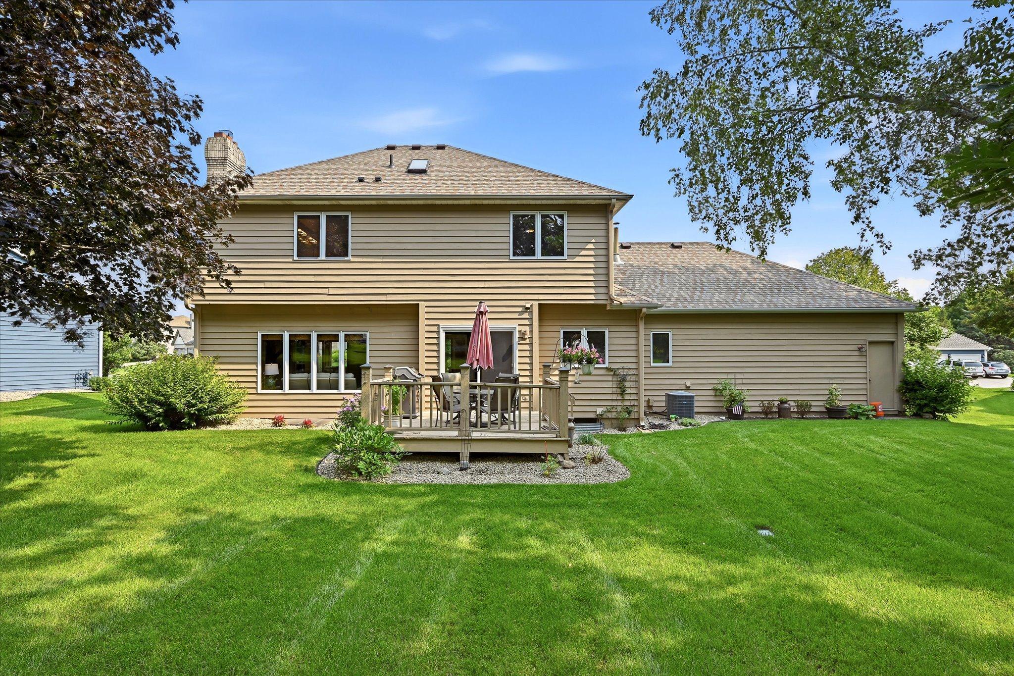 The spacious backyard offers room for a variety of outdoor activities, gardening, entertaining, or simply enjoying the open space.