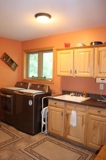Laundry room also serves as a mudroom as you enter the home from the garage