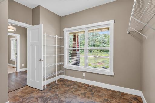 Mud Room with window looking out to front porch