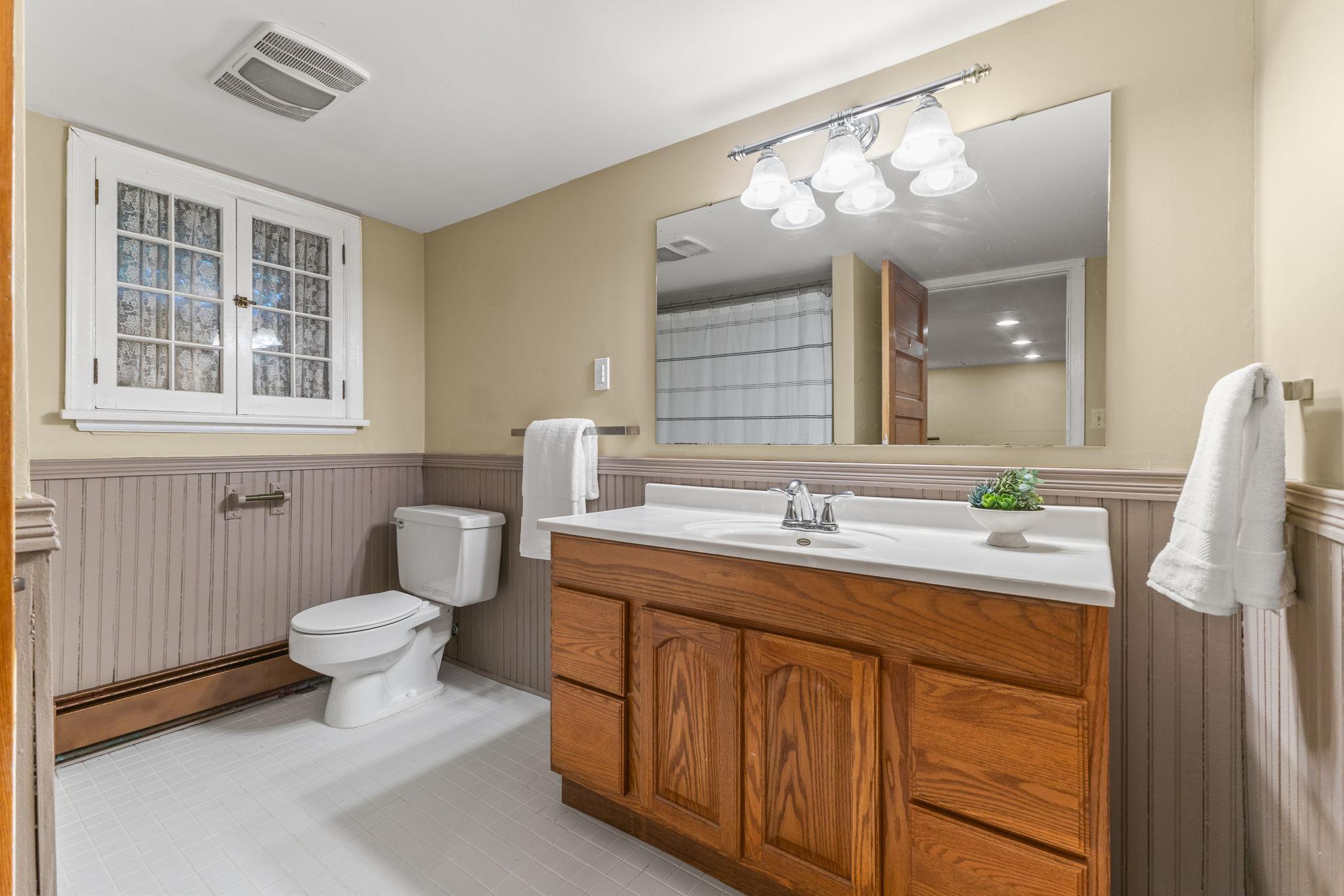 Lower Level full bathroom with tub and shower