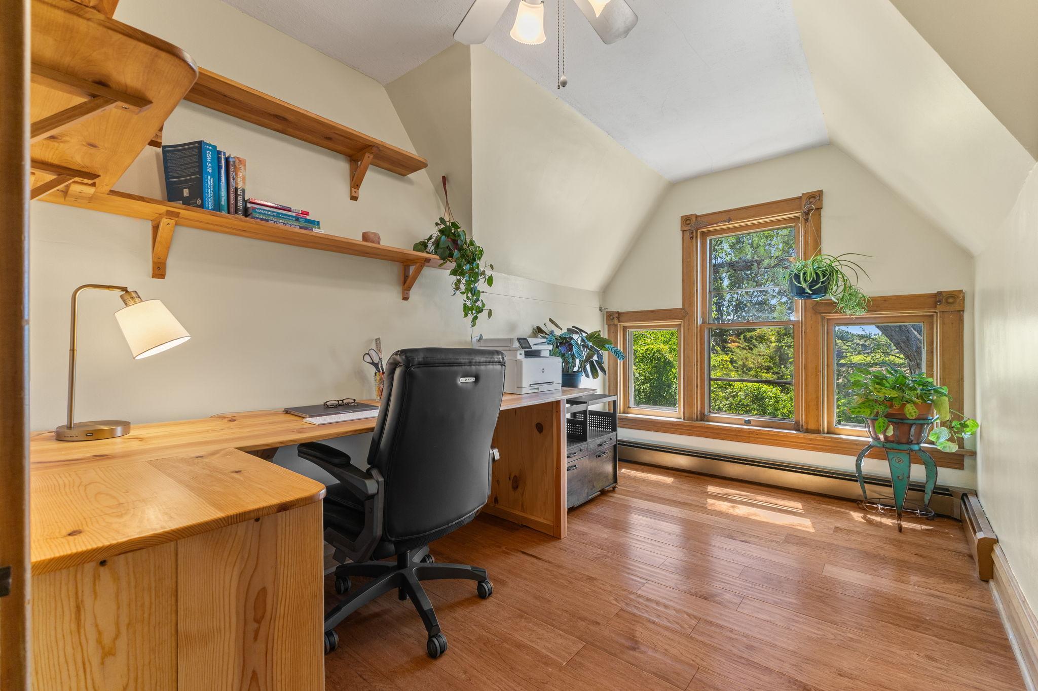 2nd Bedroom with ornate windows and built-in desk
