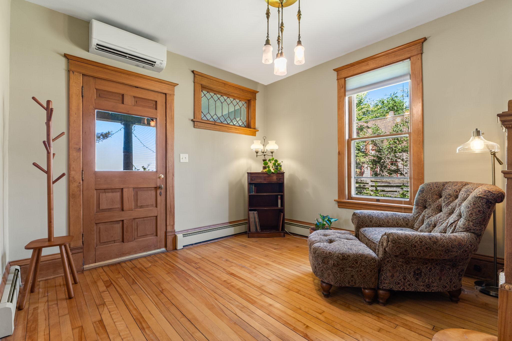 Large foyer with leaded glass window