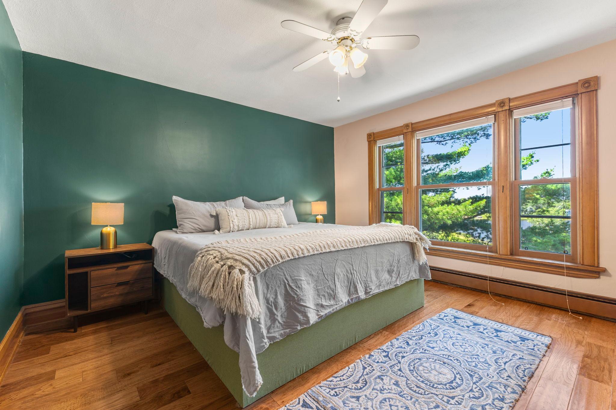 Primary bedroom with lake views!