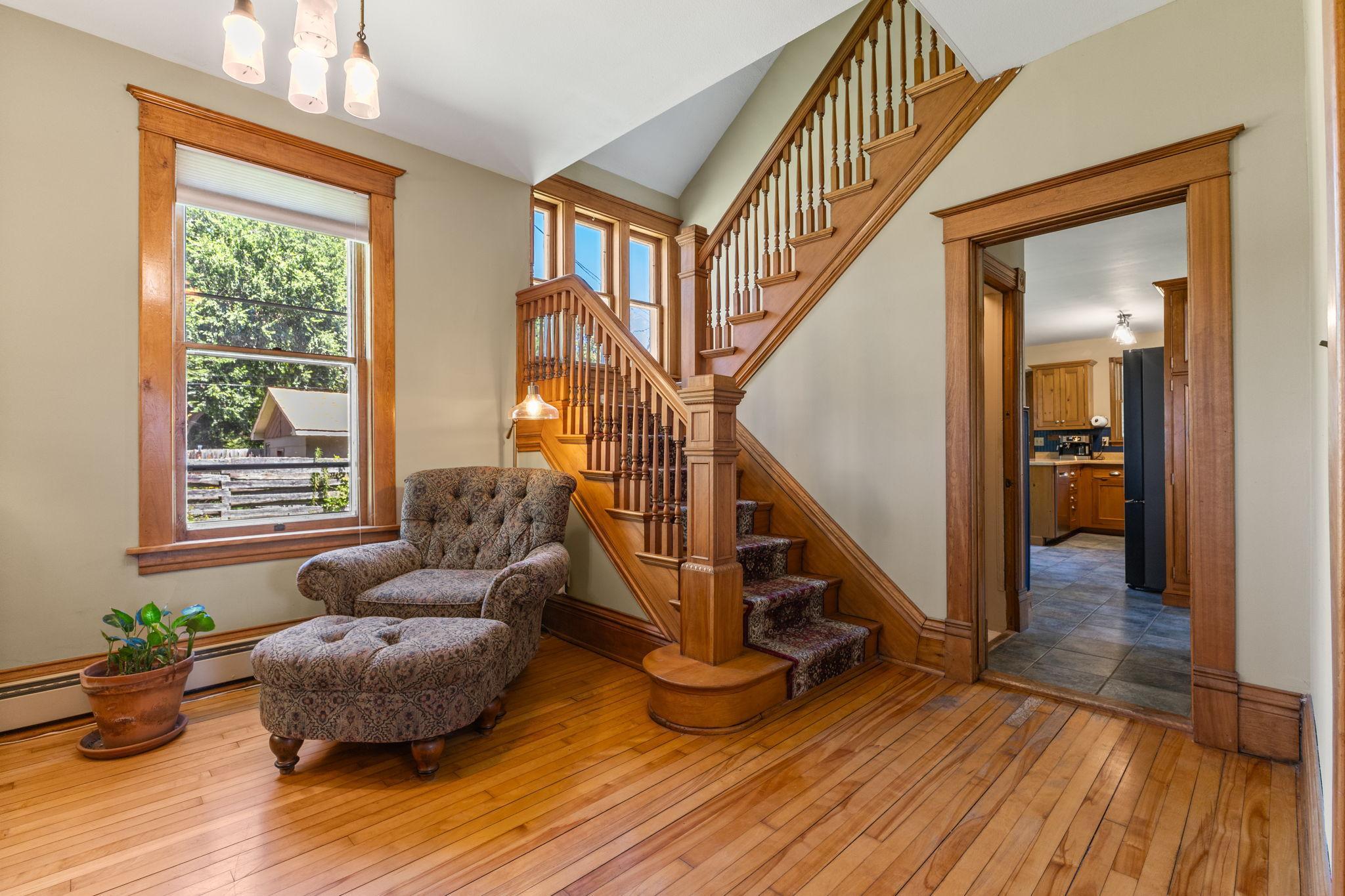 Gorgeous staircase welcomes you upon entry