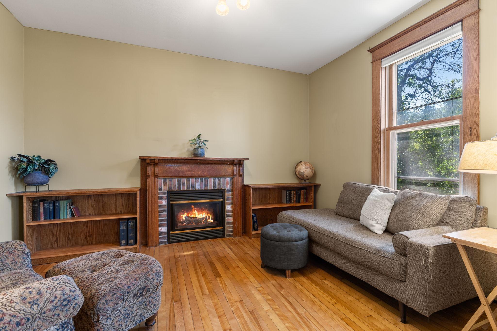 Additional Sitting Area off of Dining Room with gas fireplace and built-ins