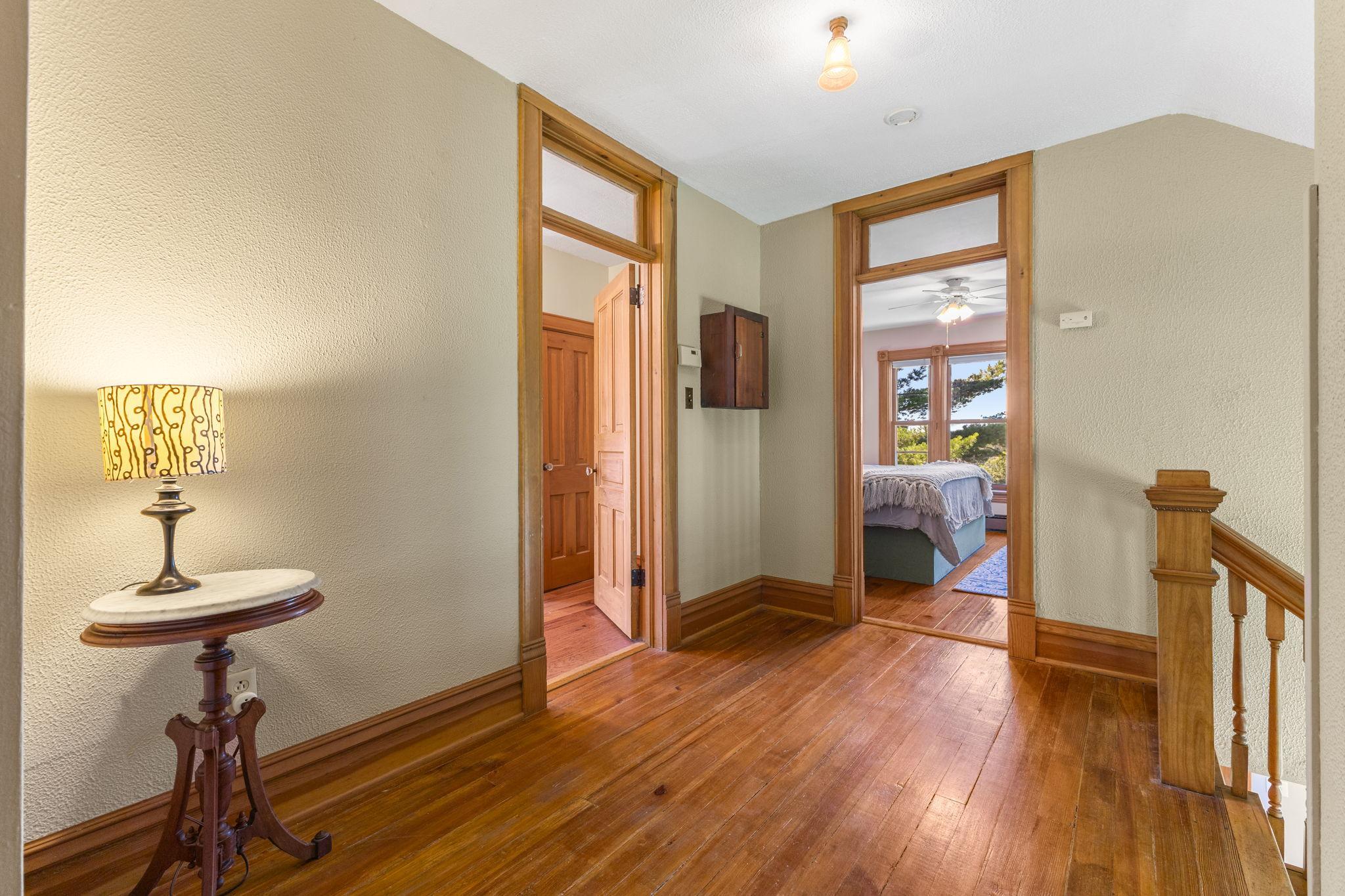Transom windows above bedroom doors!