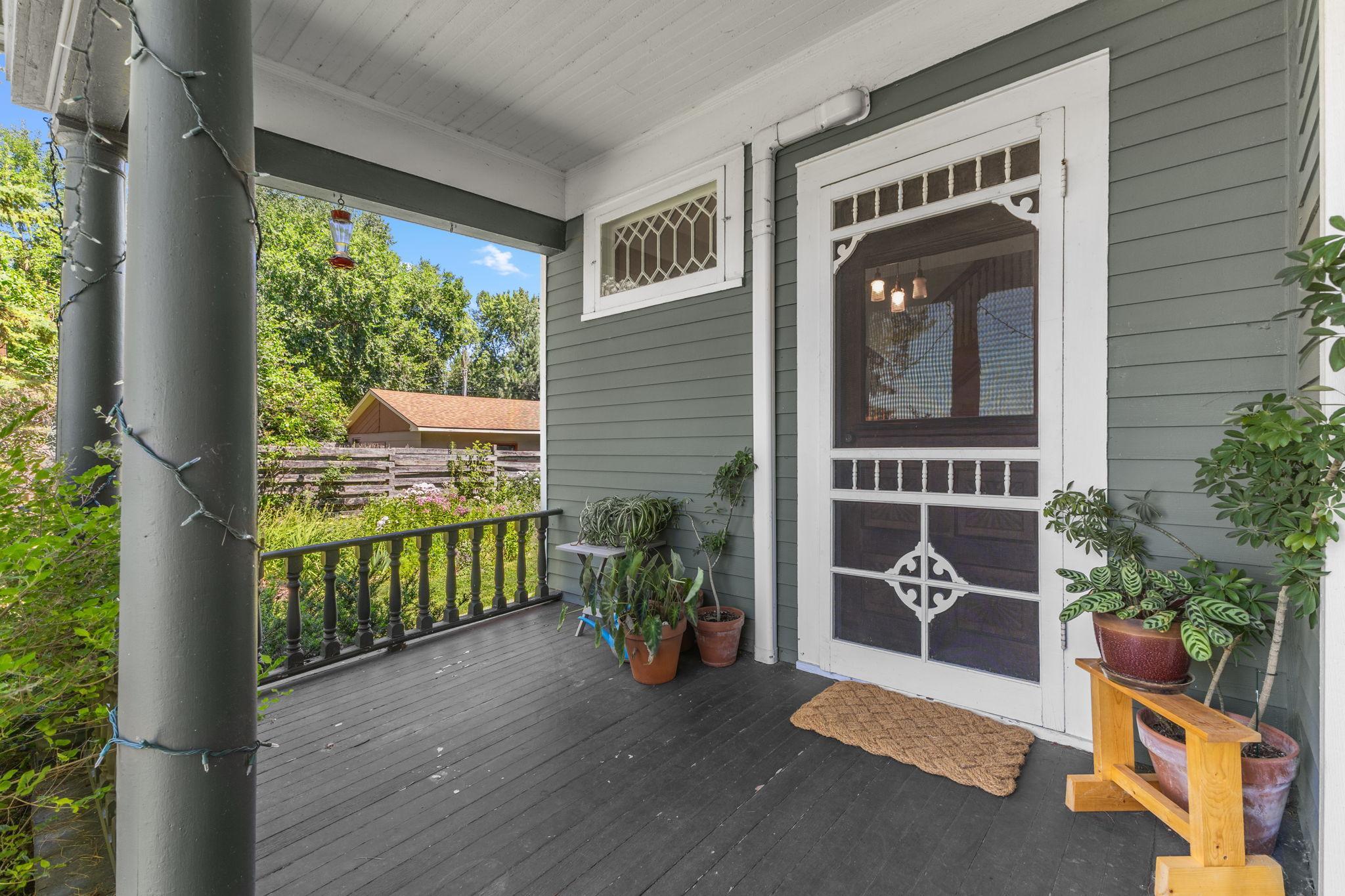 Charming front porch- slamming screen door and all!