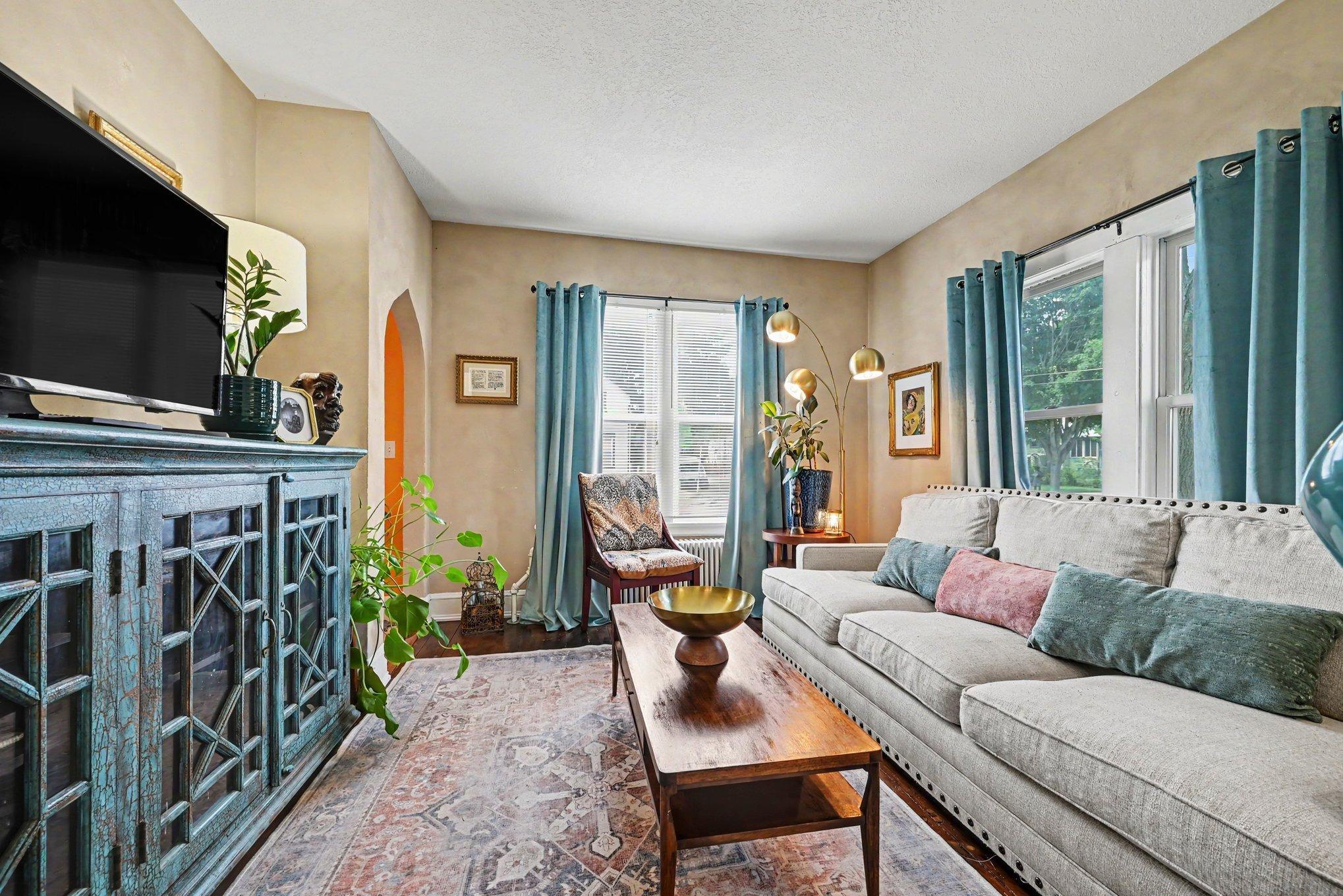 The living room sits on the front side of the home. Two large windows offer a lot of natural light. Great size for large sofa or sectional.