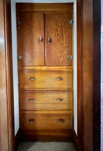 Built in storage between Living room and Kitchen