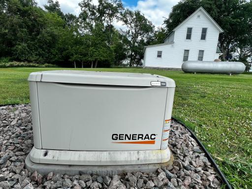 Generac Generator and 1000 Gallon Propane Tank