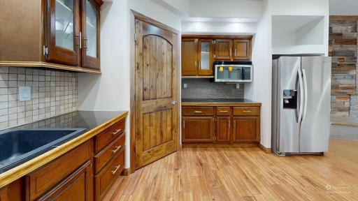 25395-County-Highway-6-Kitchen-Defurnished.jpg