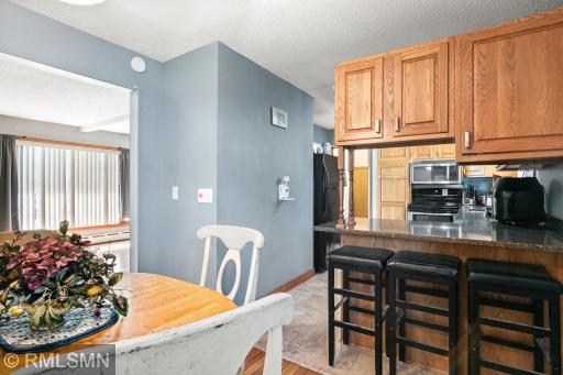 Easy access to living, dining, back porch and garage from the kitchen.