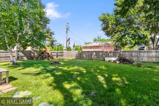 Spacious back yard is fully privacy fenced.