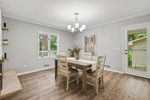 Formal dining that leads to covered side porch