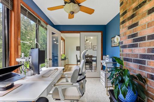 Double doors provide separation from the main living spaces while maintaining an open, connected feel.