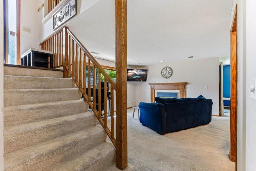 Lower-level family room with an open layout and easy access to the upper level.