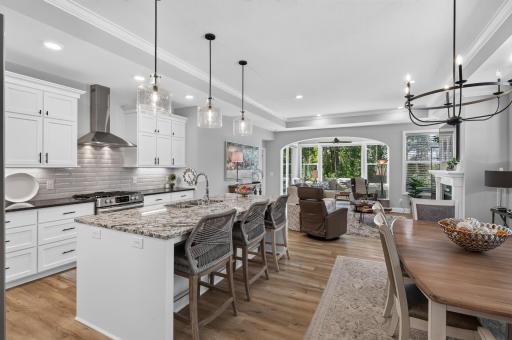 Open concept kitchen, dining & living room