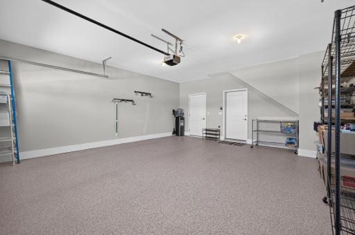 Fully finished garage with epoxy floor.